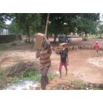 carrying blocks to the new church ..JPG